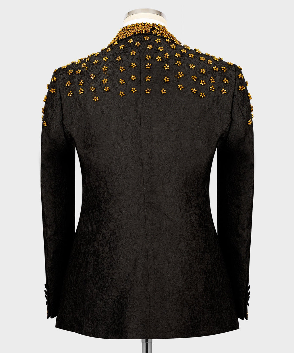 Black tuxedo jacket back view with dense gold bead floral embroidery across shoulders