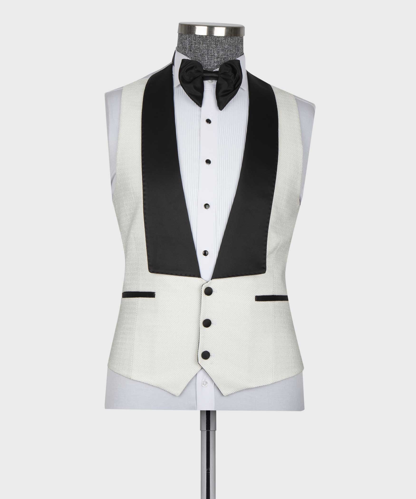 White tuxedo vest with black satin panel, black bow tie, striped white shirt