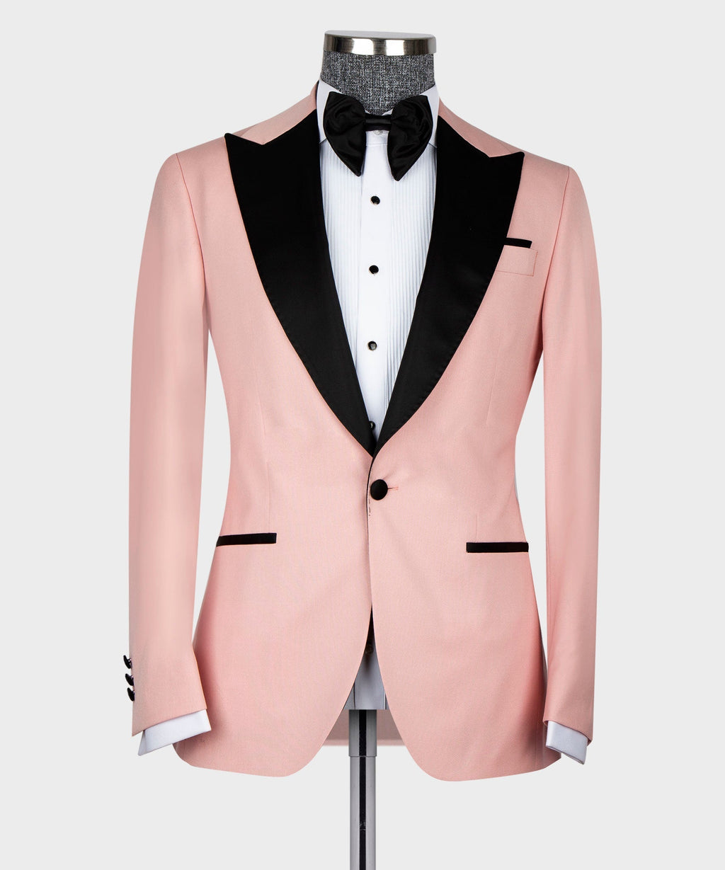 Pink tuxedo jacket with black lapel trim and buttoned front, straight-on view