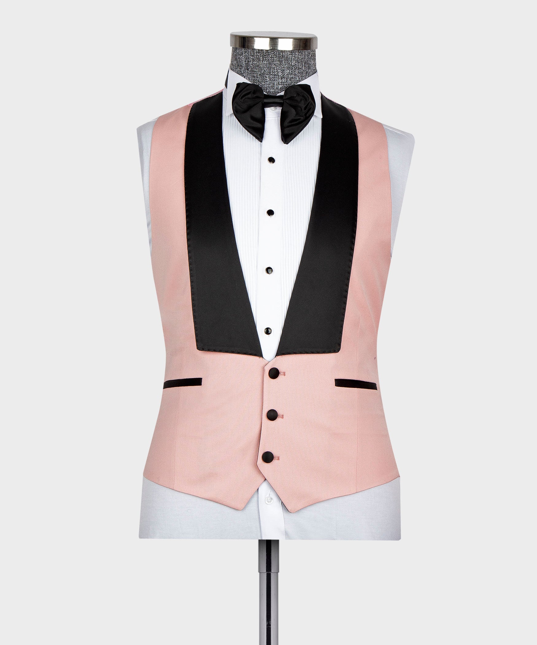 Pink tuxedo vest front with black lapel panel and black bow tie, sleeveless view