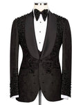 Black beaded tuxedo on a mannequin against a white background