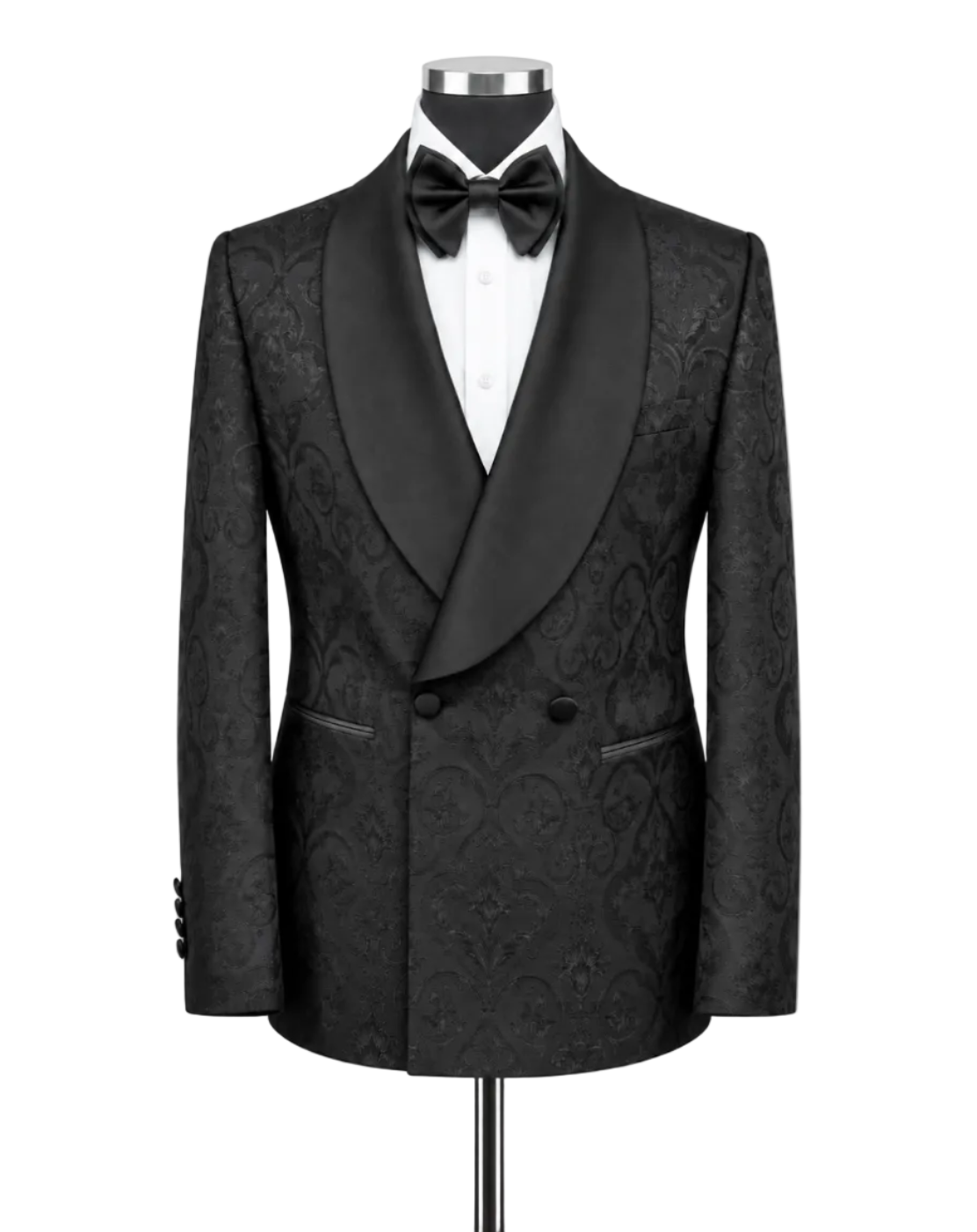 A black double-breasted tuxedo jacket with a subtle jacquard paisley pattern, styled on a mannequin with a white dress shirt and black bow tie against a light gray background.