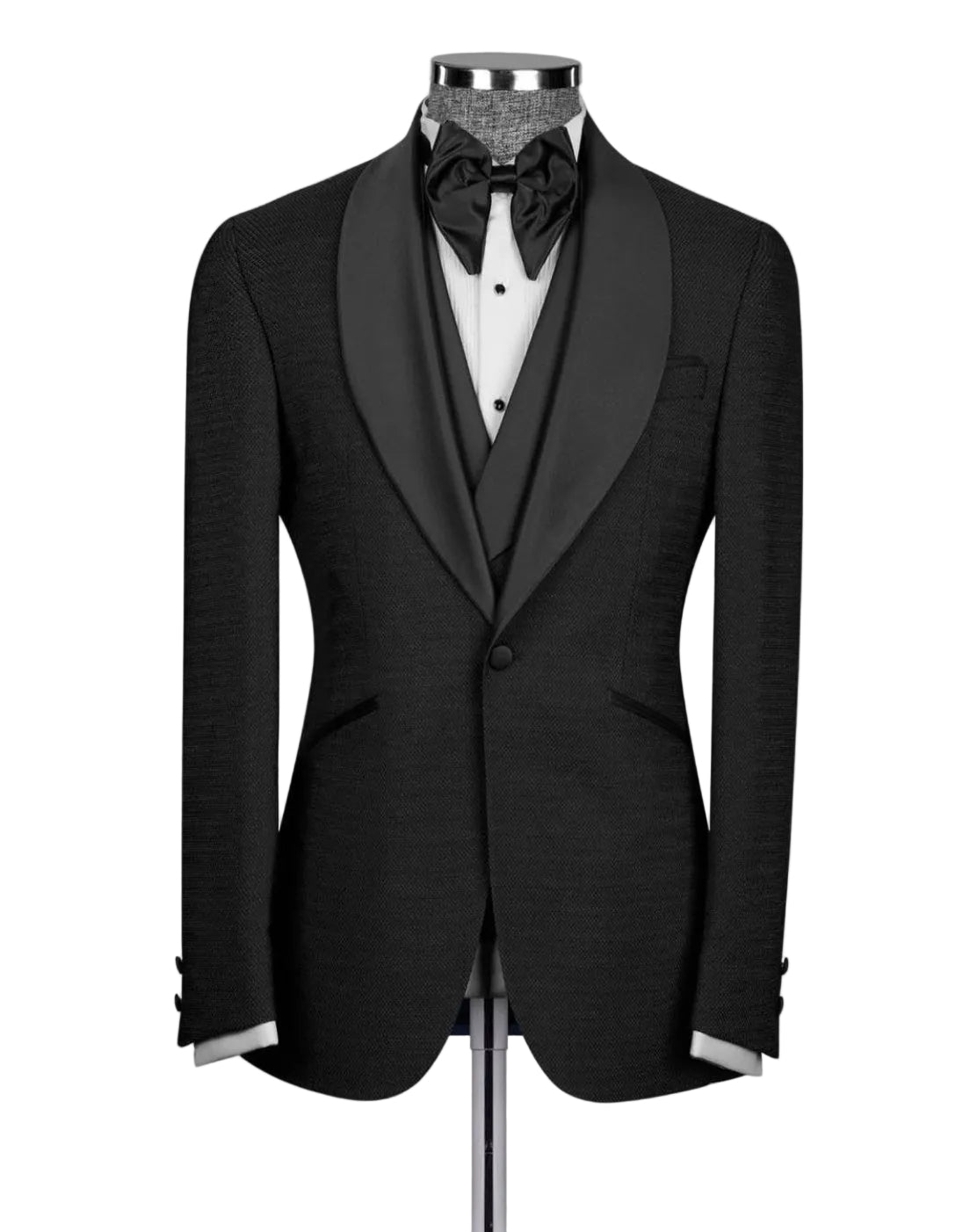 A black tuxedo jacket with satin shawl lapels, displayed on a mannequin torso with a white dress shirt, black bow tie, and black vest 