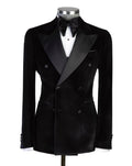 A black double-breasted tuxedo jacket with satin peak lapels, displayed on a mannequin torso with a white dress shirt, black bow tie, and black cufflinks
