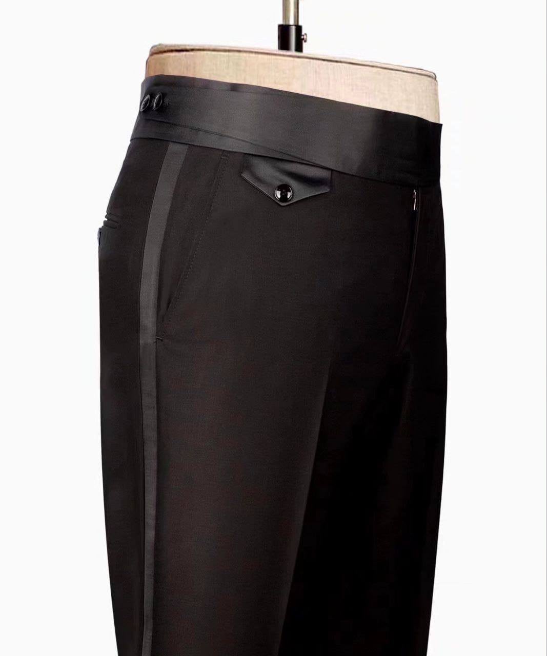Black pants on a mannequin with a plain background