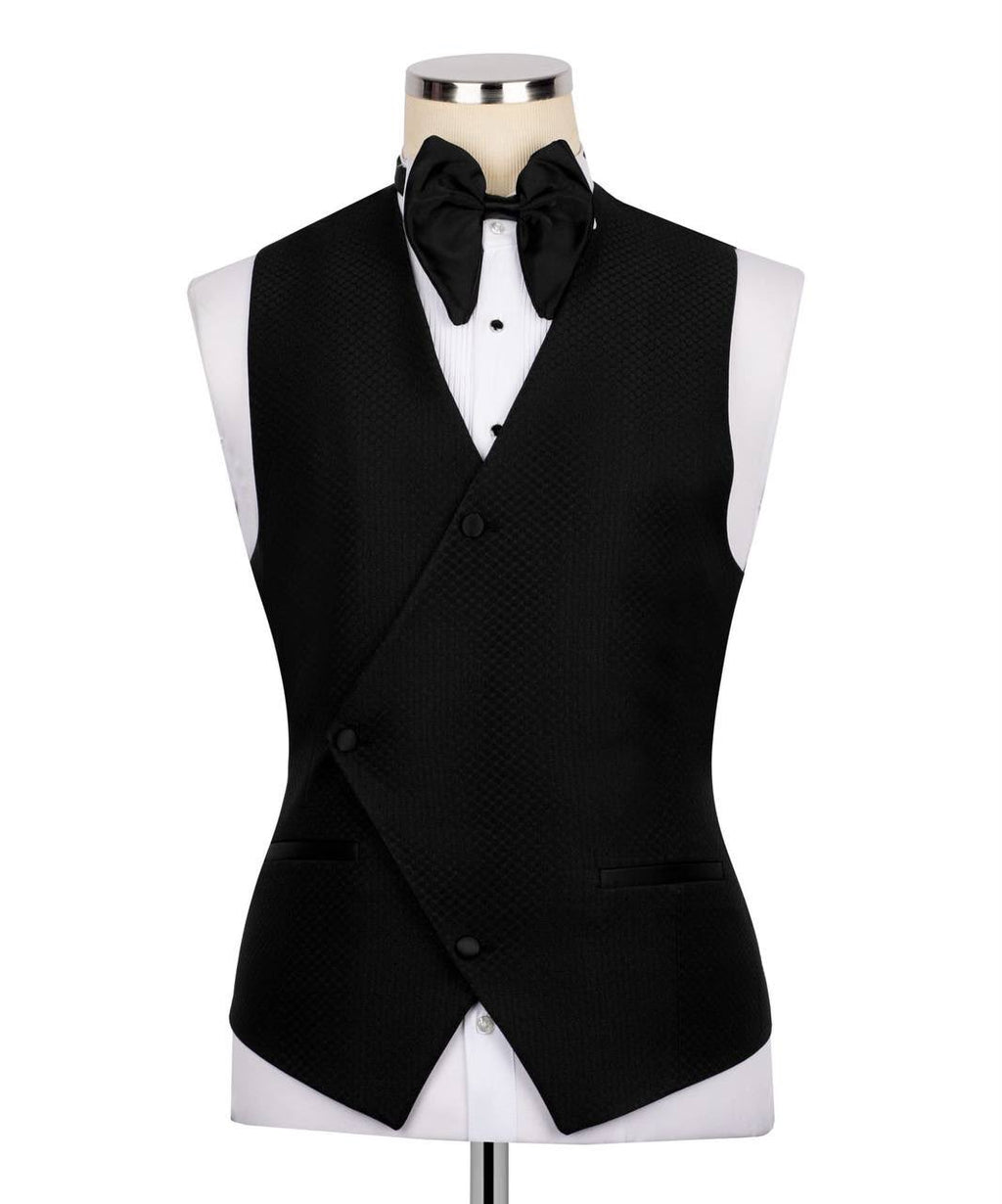 Black tuxedo vest with bow tie on a mannequin 