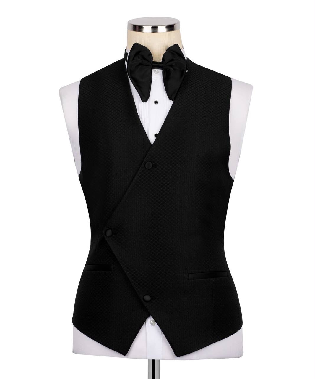 Black tuxedo vest with bow tie on a mannequin 