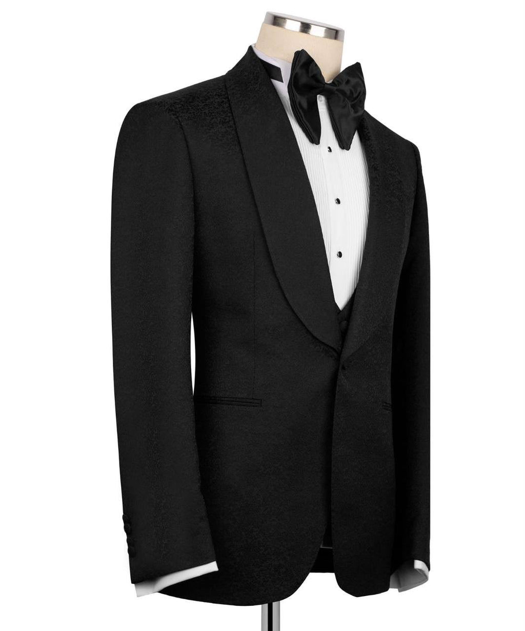 Black tuxedo with white shirt and bow tie on a mannequin 