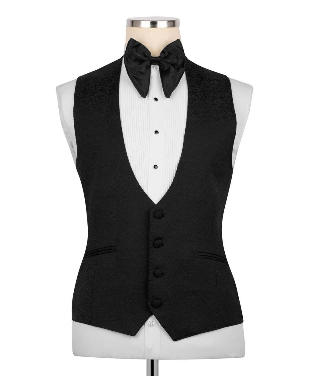 Black tuxedo vest with bow tie on a mannequin 