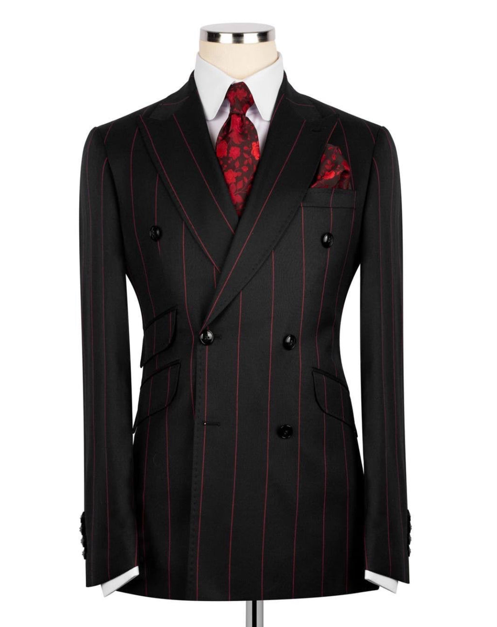 Navy pinstripe suit with red accents on a mannequin 