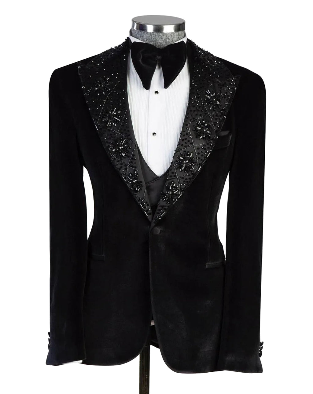 Black tuxedo with decorative lapels on a mannequin against a white background