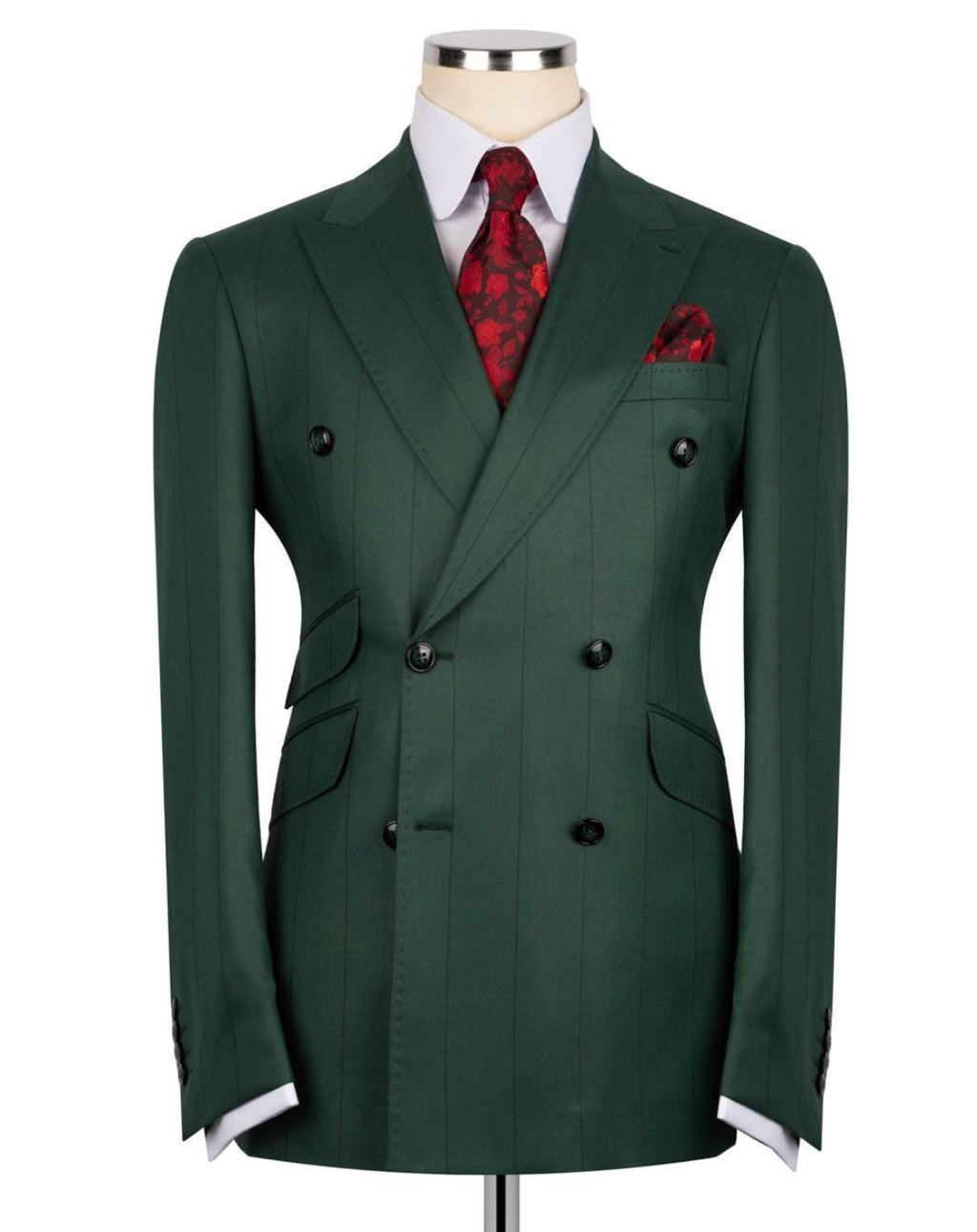 A dark green double-breasted suit jacket displayed on a mannequin torso, styled with a white dress shirt, a red patterned tie, and a matching red pocket square against a plain white background.
