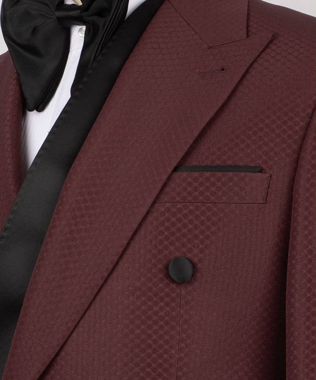 Maroon blazer with black bow tie and pocket square 