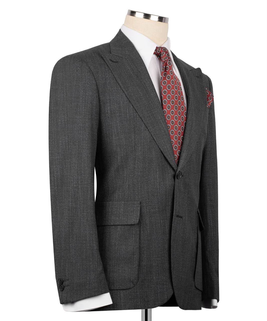 A dark gray textured wool suit jacket displayed on a mannequin torso, styled with a white dress shirt, a red and black patterned tie, and a matching pocket square.
