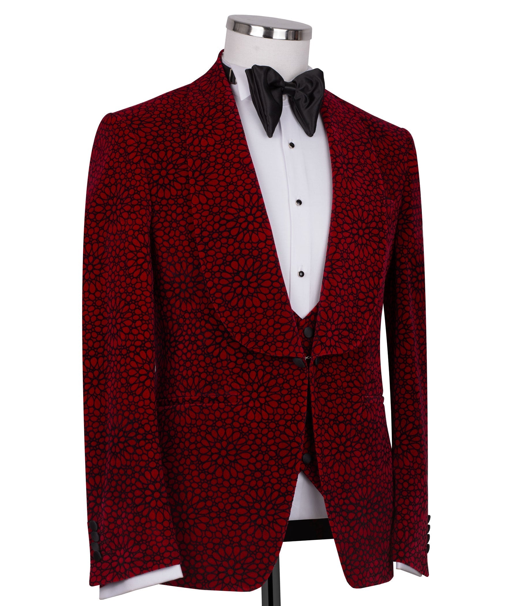 Red patterned formal tuxedo jacket with notch lapels, black bow tie and white shirt/vest