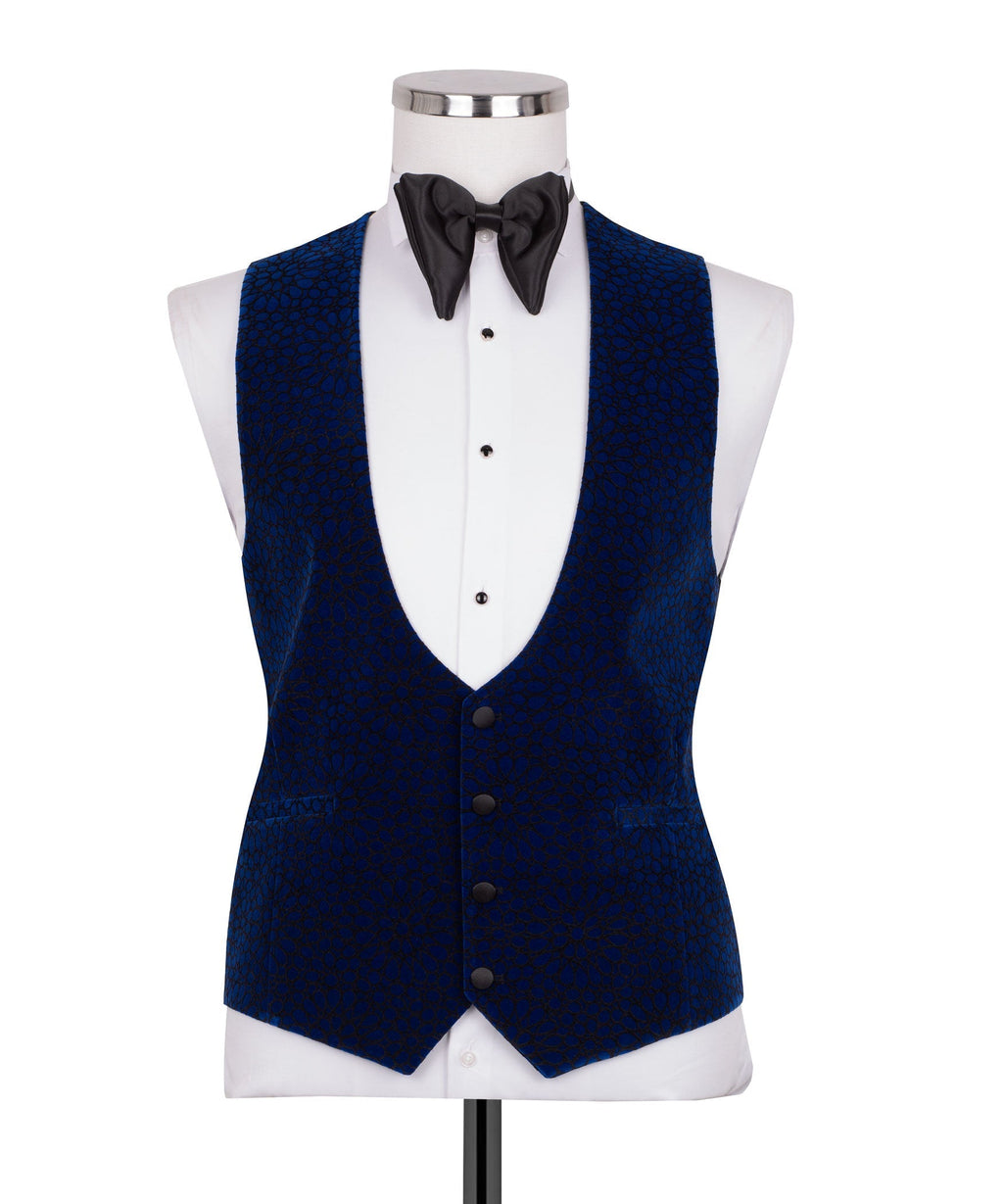 Blue velvet tuxedo vest with black bow tie and white dress shirt