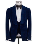 Blue velvet tuxedo jacket with matching vest and black bow tie