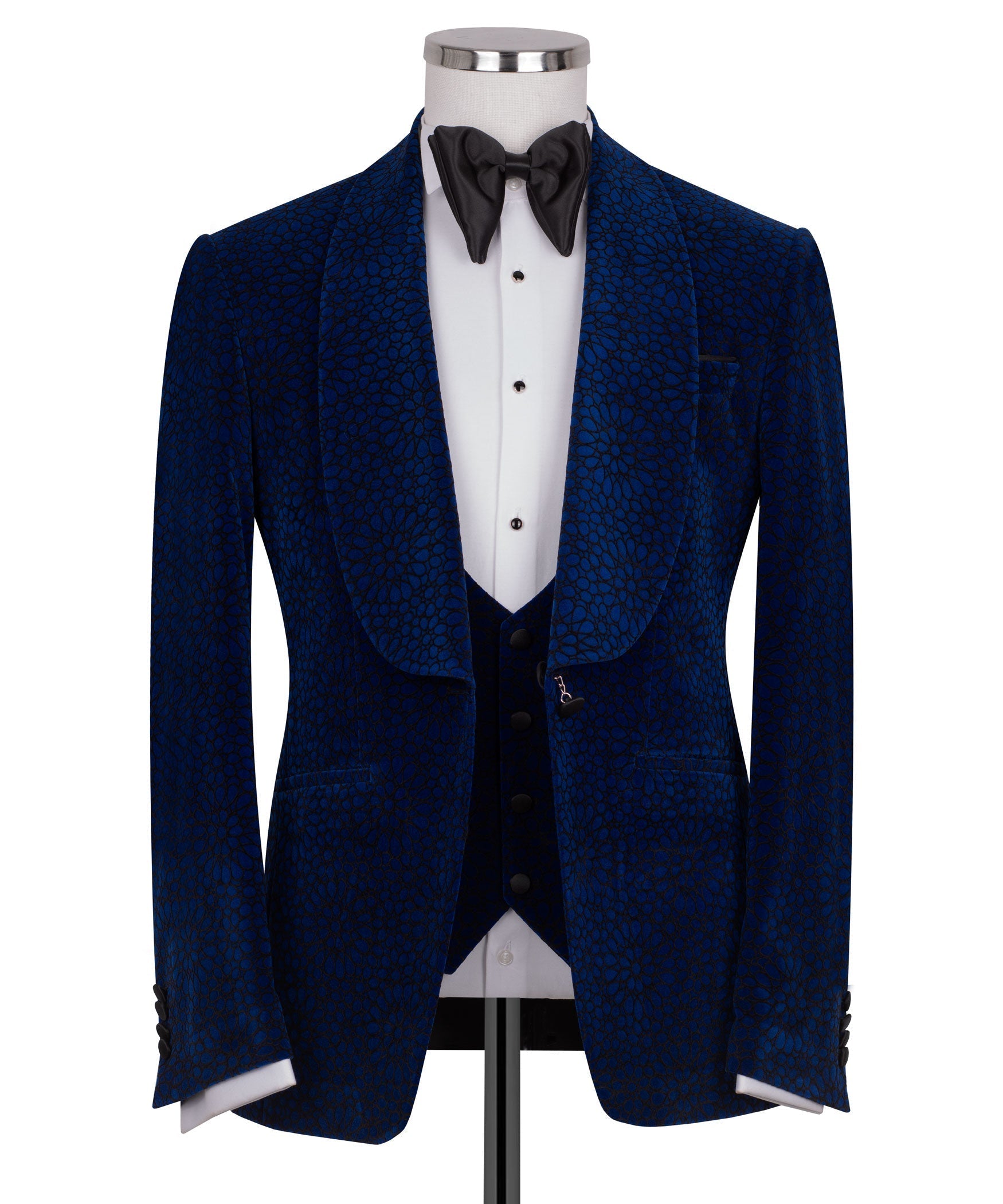 Blue velvet tuxedo jacket with matching vest and black bow tie