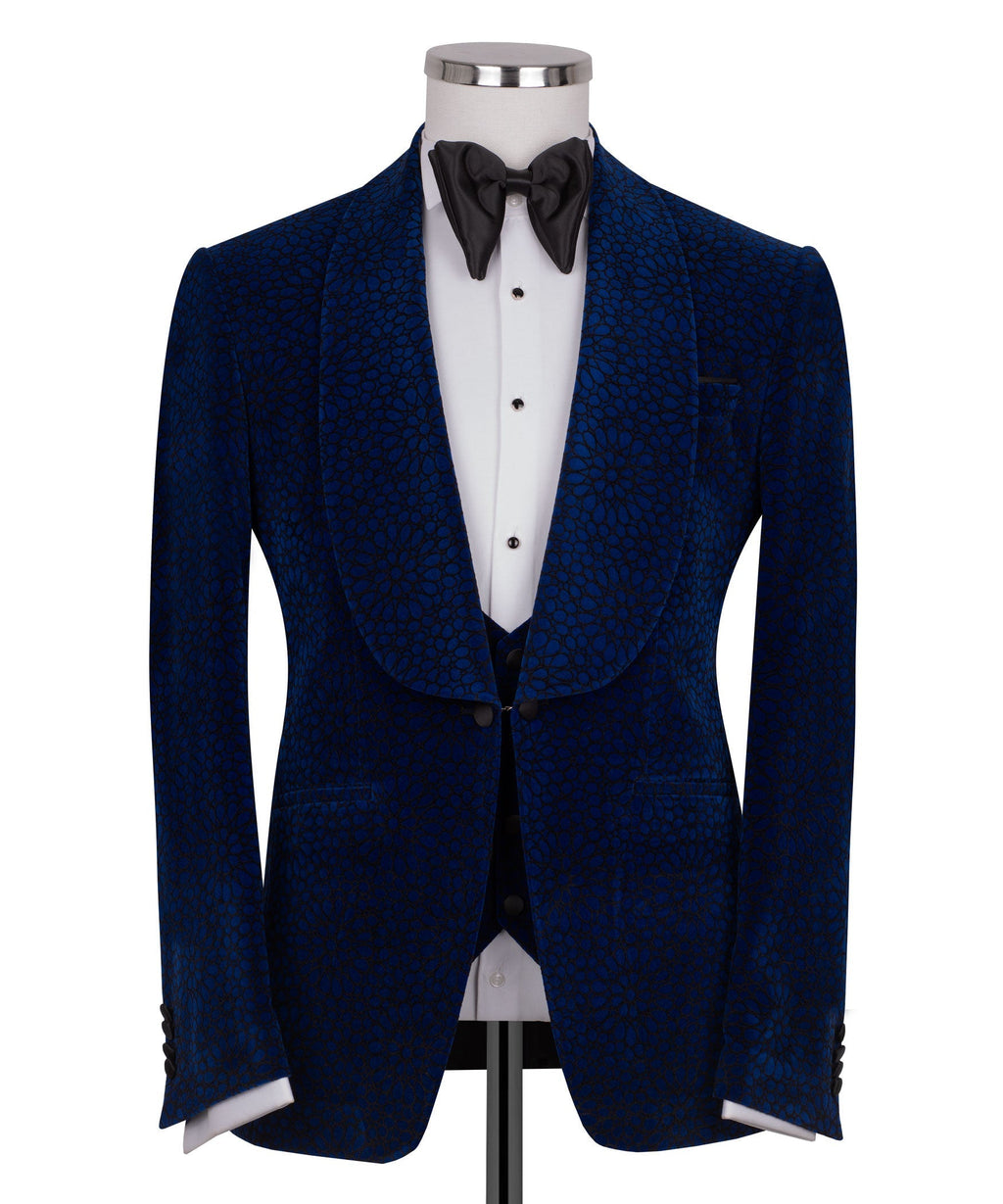 Blue velvet tuxedo jacket with notch lapels and black bow tie