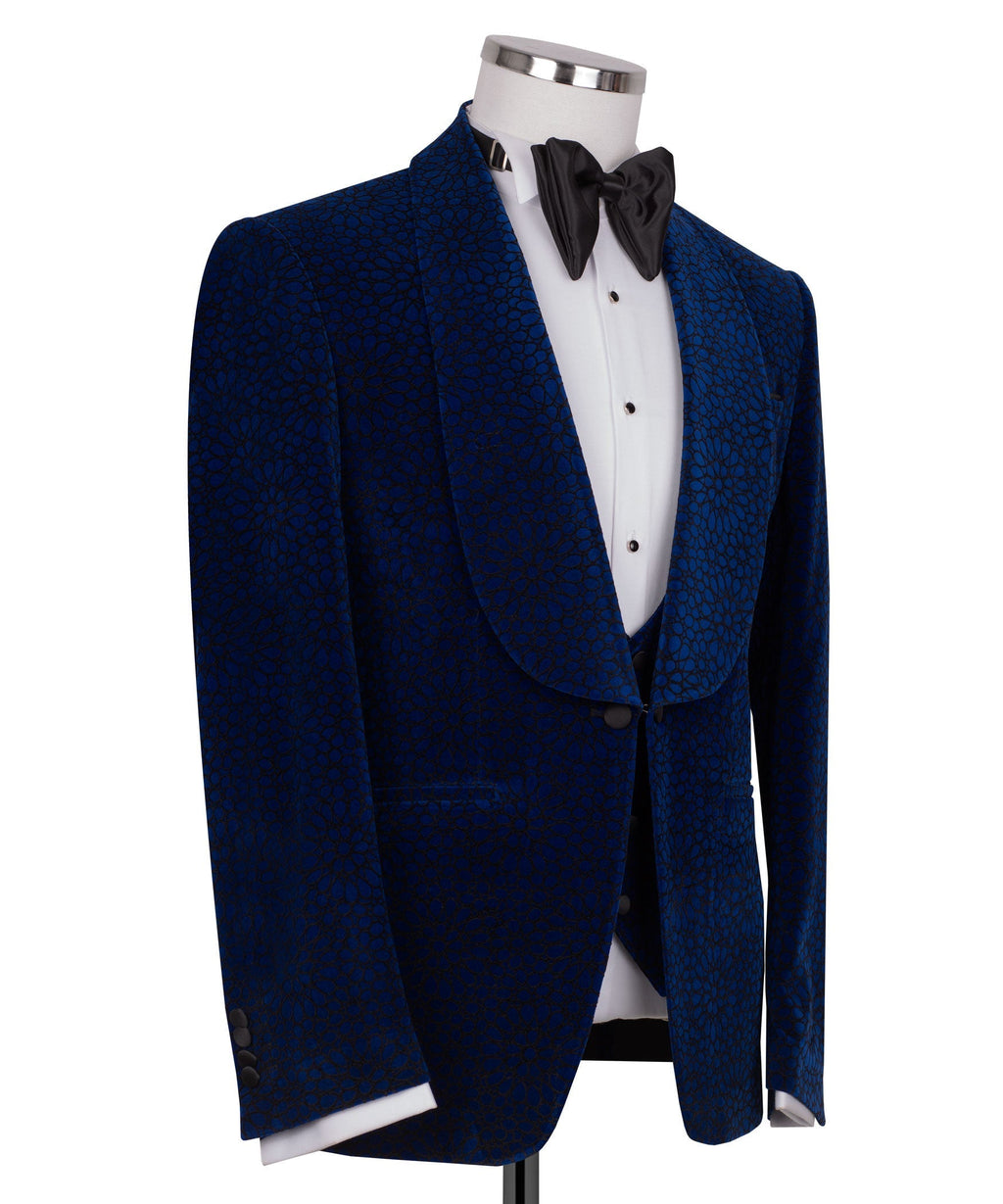 Blue velvet tuxedo jacket, side view, black bow tie and white dress shirt