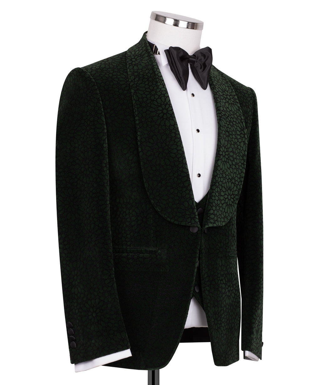 Front view tuxedo set: green patterned velvet jacket, black vest with bow tie