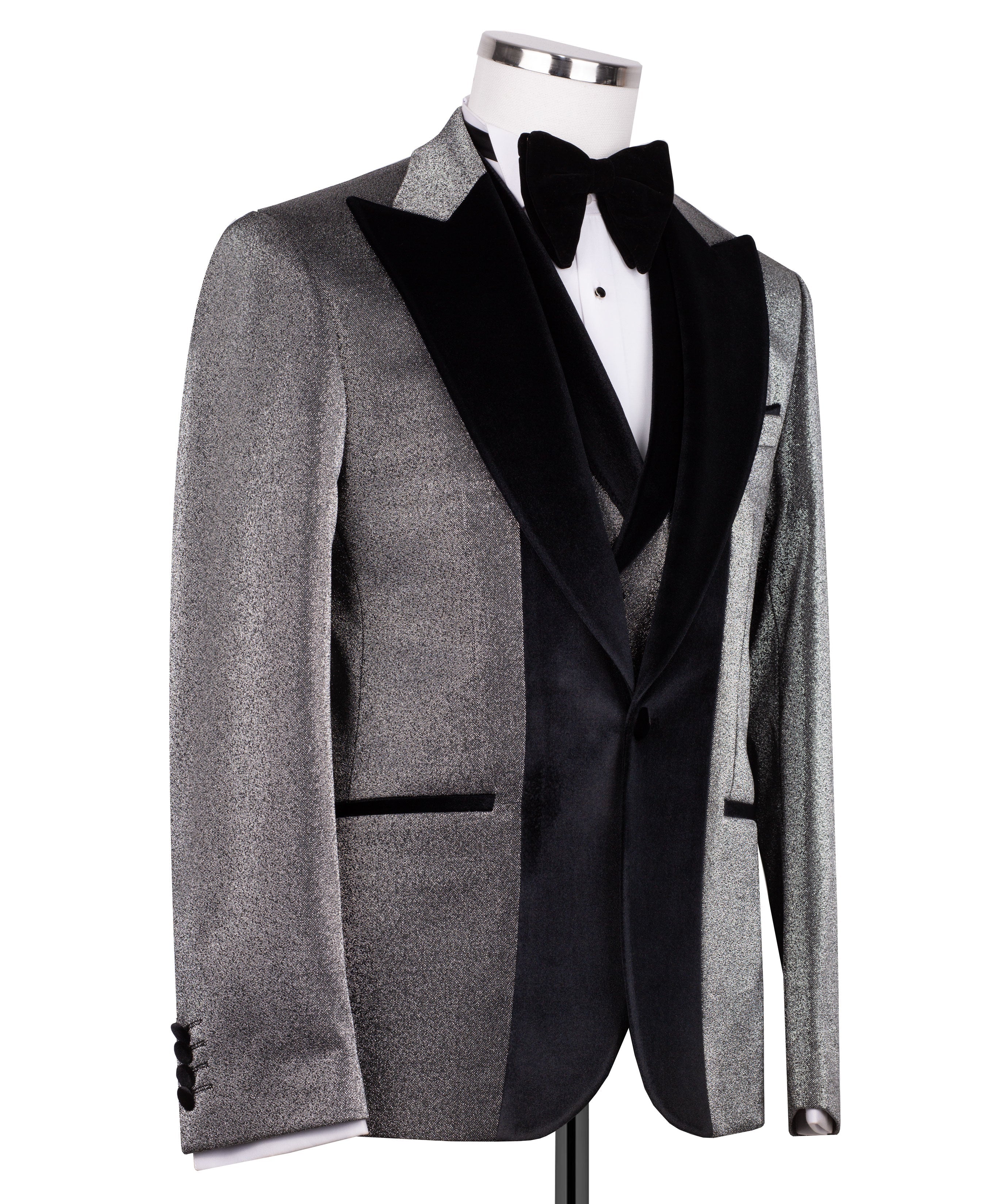Black tuxedo jacket with velvet collar, satin lapels, and bow tie