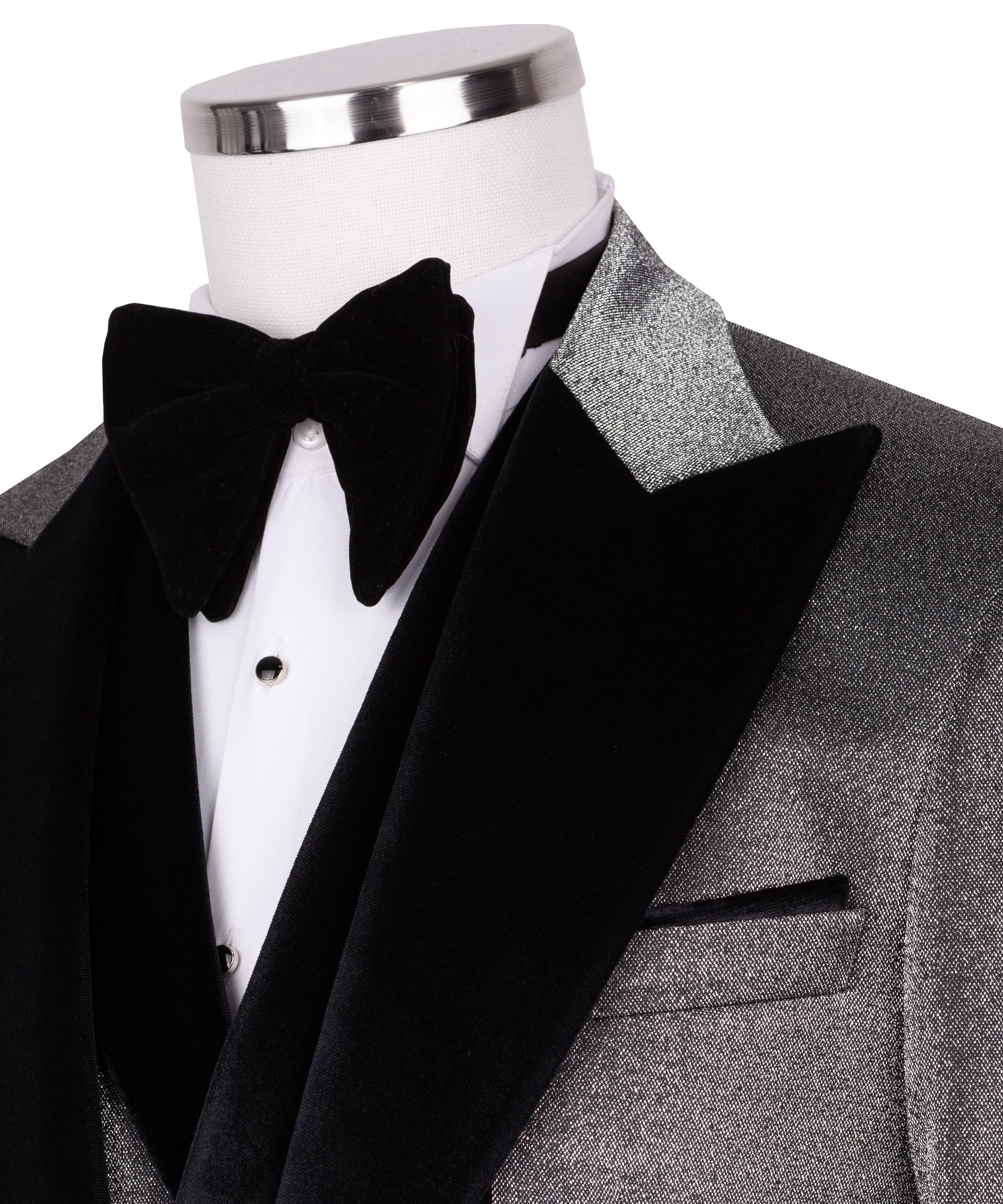 Close-up: black velvet bow tie and satin lapels on tuxedo jacket