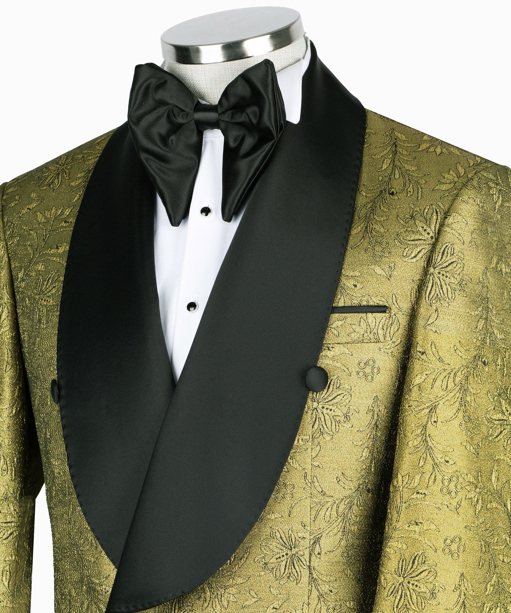 Close-up of black satin bow tie and lapel on gold patterned tuxedo jacket