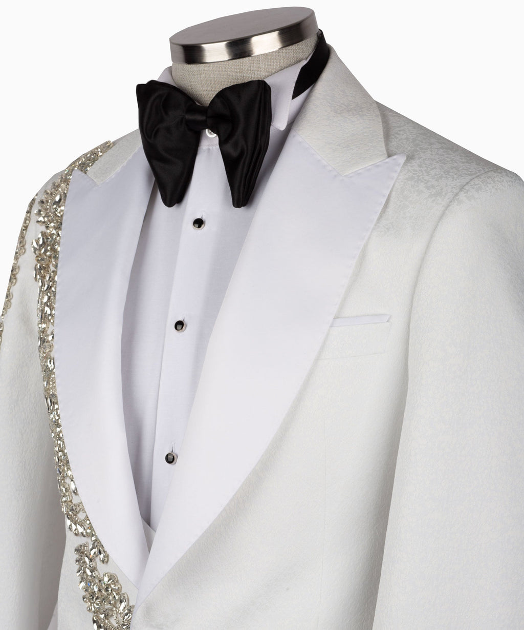 Close-up light gray tuxedo collar with black bow tie and gold stone edging