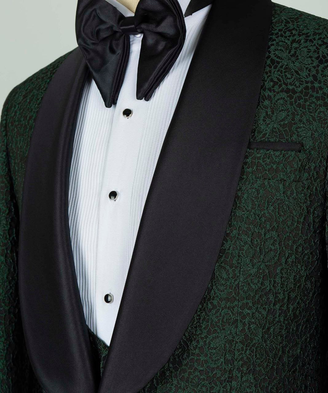 Black tuxedo with white shirt and black bow tie