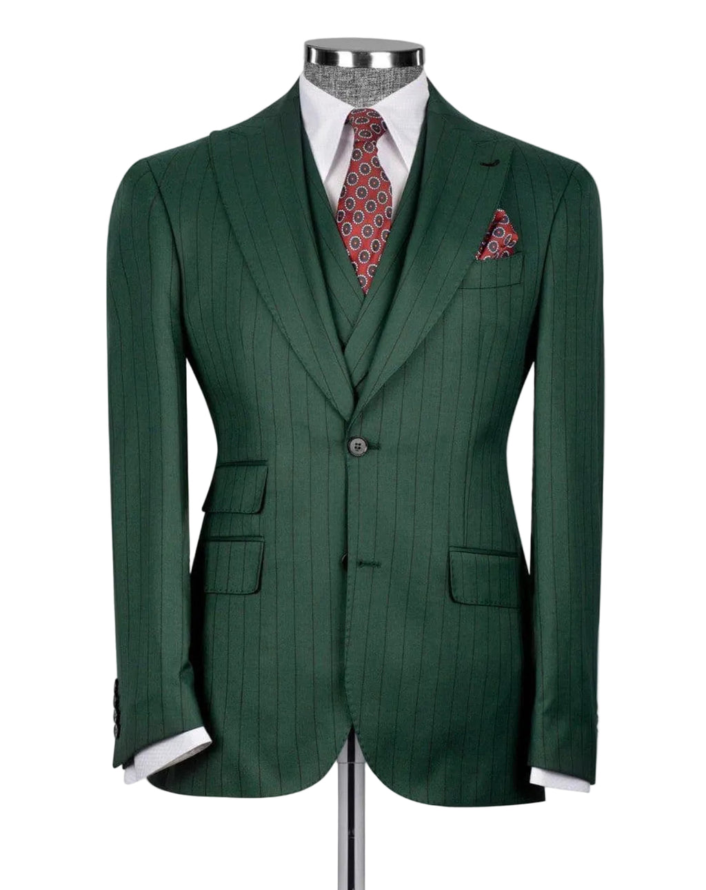 Green suit jacket on a mannequin with a white shirt and patterned tie and pocket square.