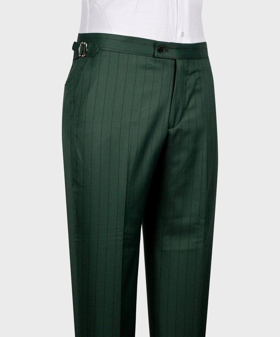 Green pleated pants on a white background