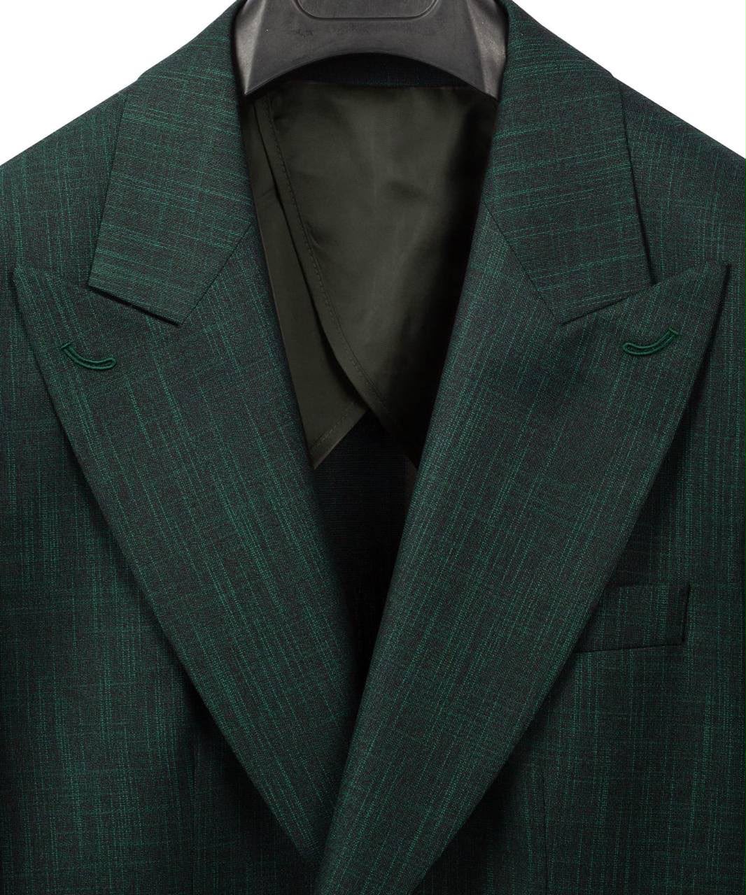A close-up of a dark green pinstripe suit jacket with notched lapels, displayed on a hanger against a white background.