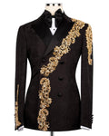 Black tuxedo jacket with gold embroidery on a mannequin against a white background