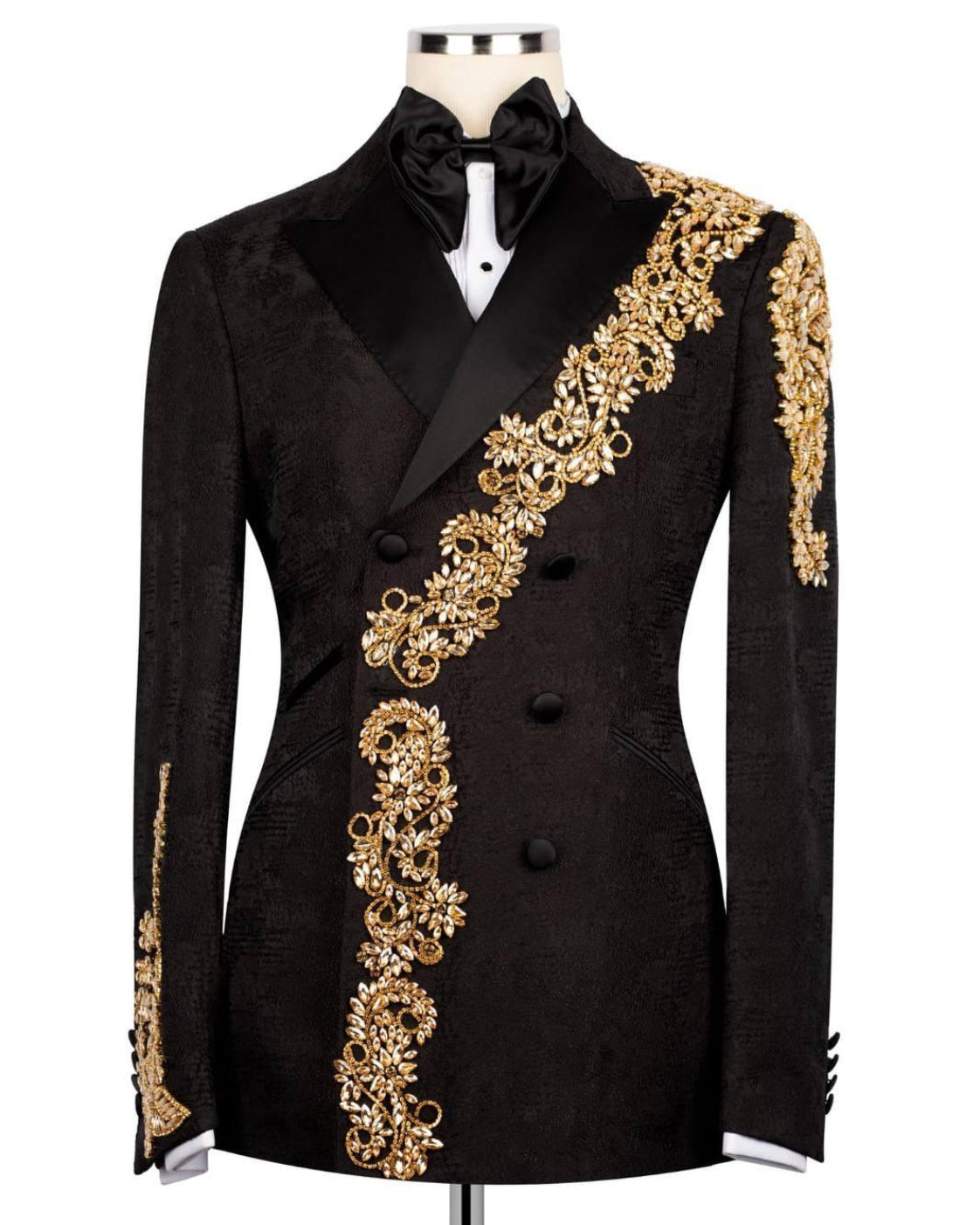 Black tuxedo jacket with gold embroidery on a mannequin against a white background