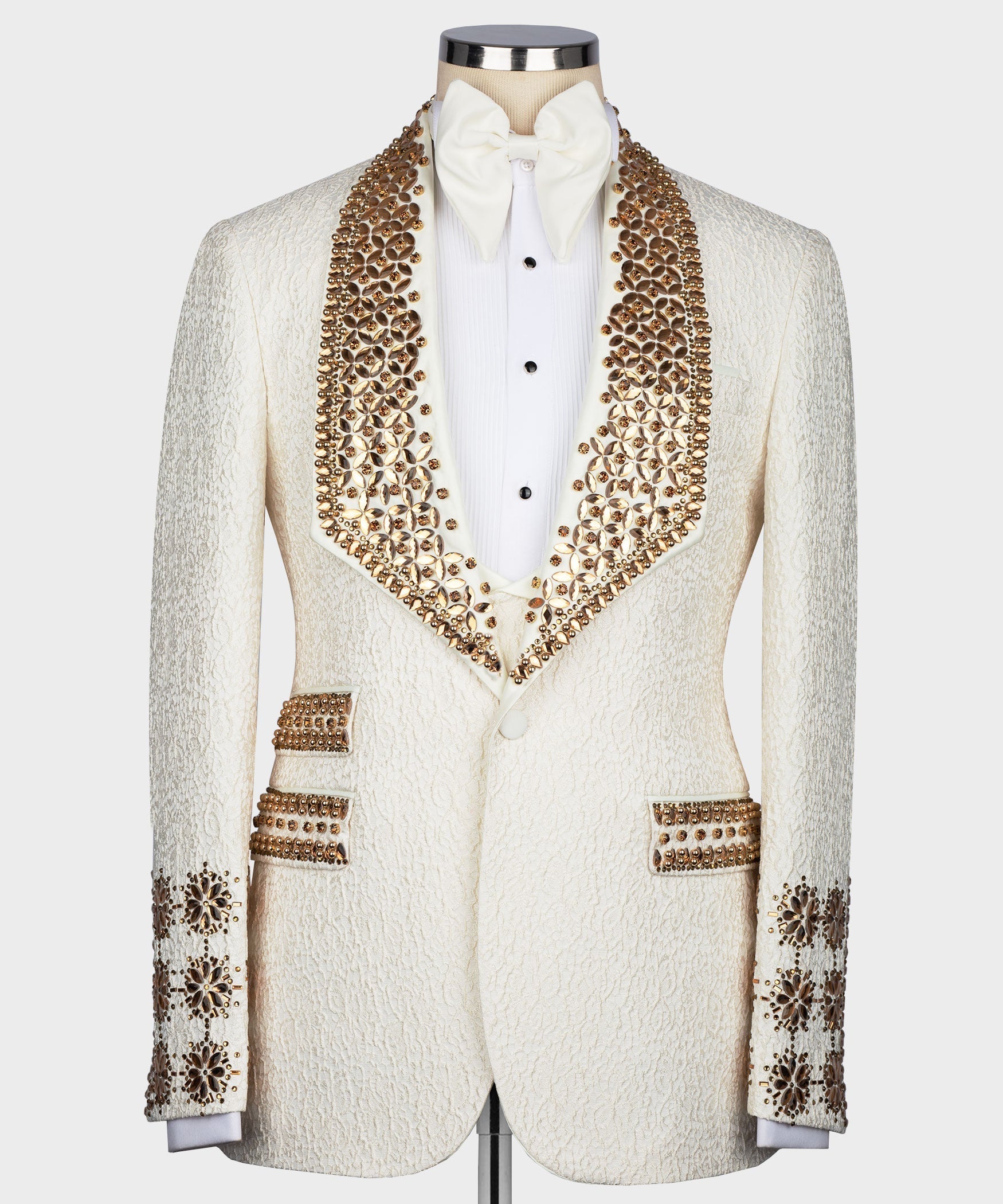 White silk tuxedo jacket with gold jeweled lapels and satin bow tie