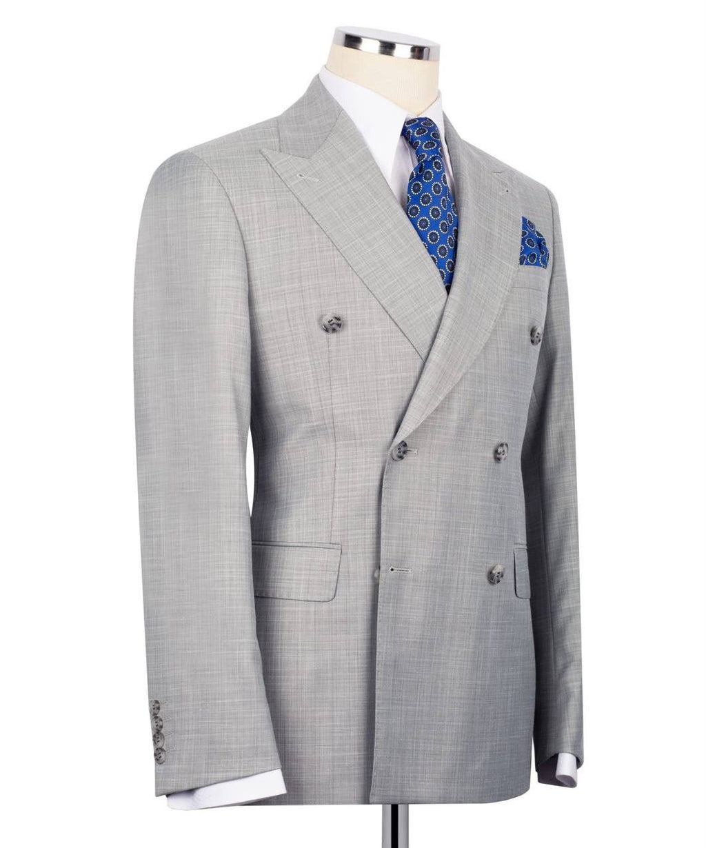 Gray checkered suit jacket on a mannequin with a white background