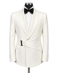 An ivory white tailored tuxedo jacket with a shawl collar and wrap-style waist tie, displayed on a mannequin with a black bow tie and white dress shirt against a light gray background.