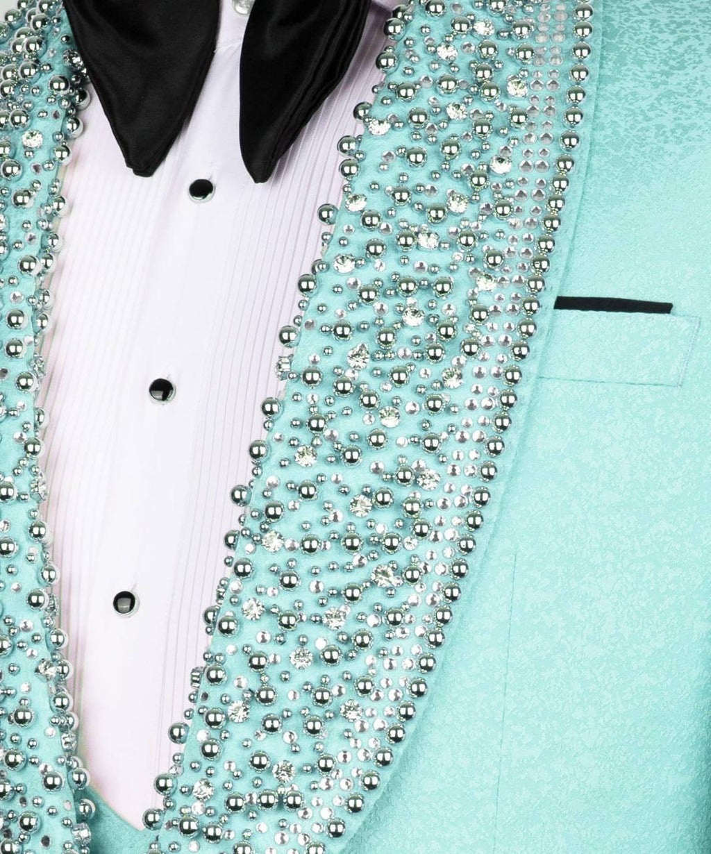 Light blue tuxedo with decorative beads on a white background