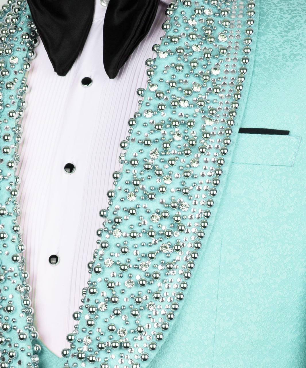 Light blue tuxedo with decorative beads on a white background