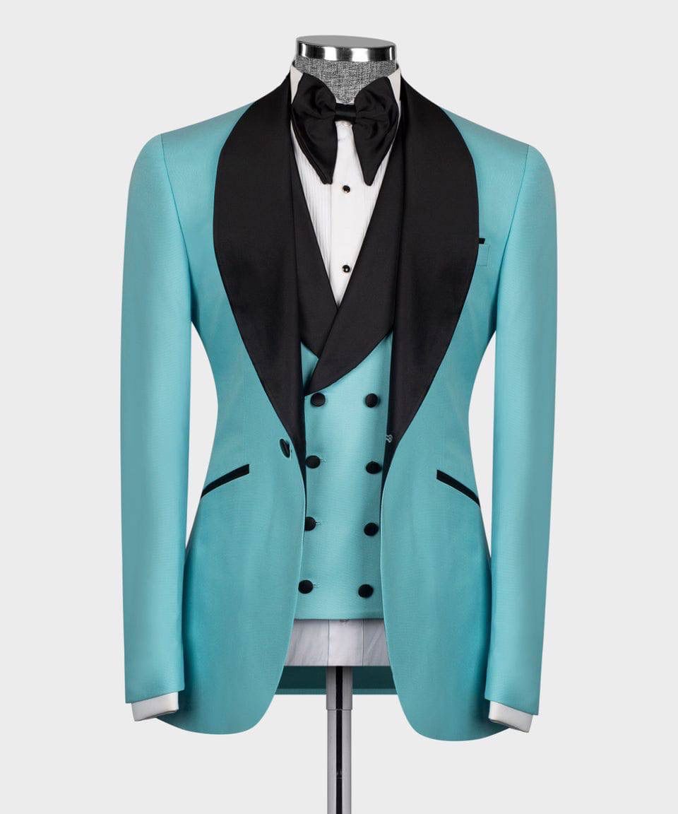Turquoise tuxedo with black lapels on a mannequin against a white background