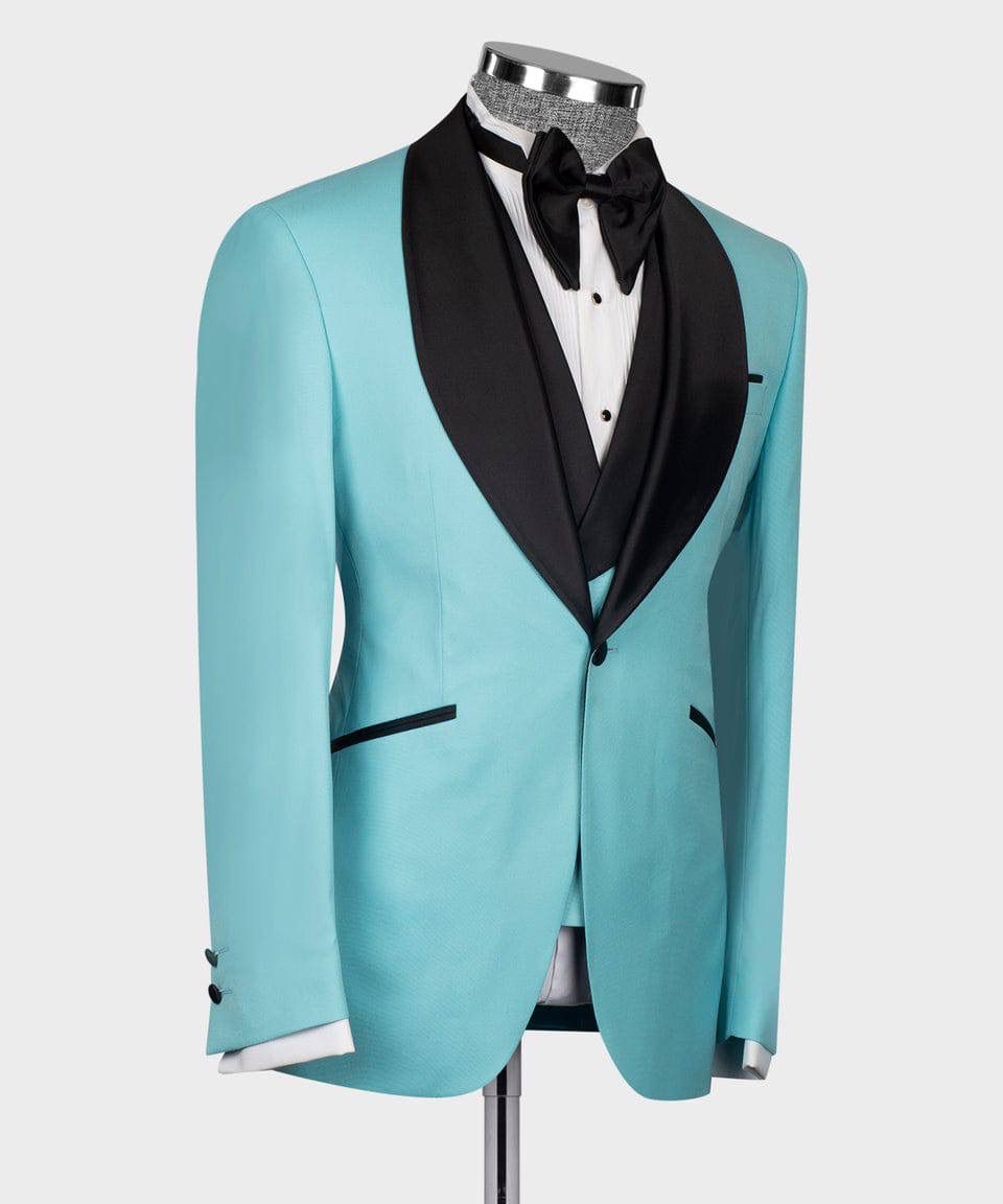 Turquoise tuxedo jacket with black lapels on a mannequin against a white background