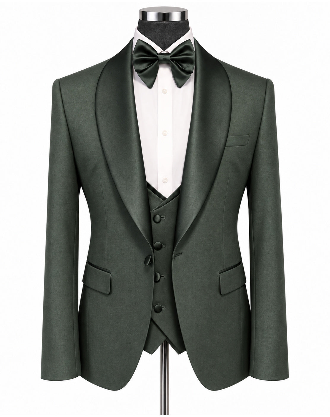 A dark forest green three-piece tuxedo set displayed on a mannequin, featuring a single-breasted jacket with satin shawl lapels, a matching vest, a white dress shirt, a dark green bow tie, and a matching green waistcoat.