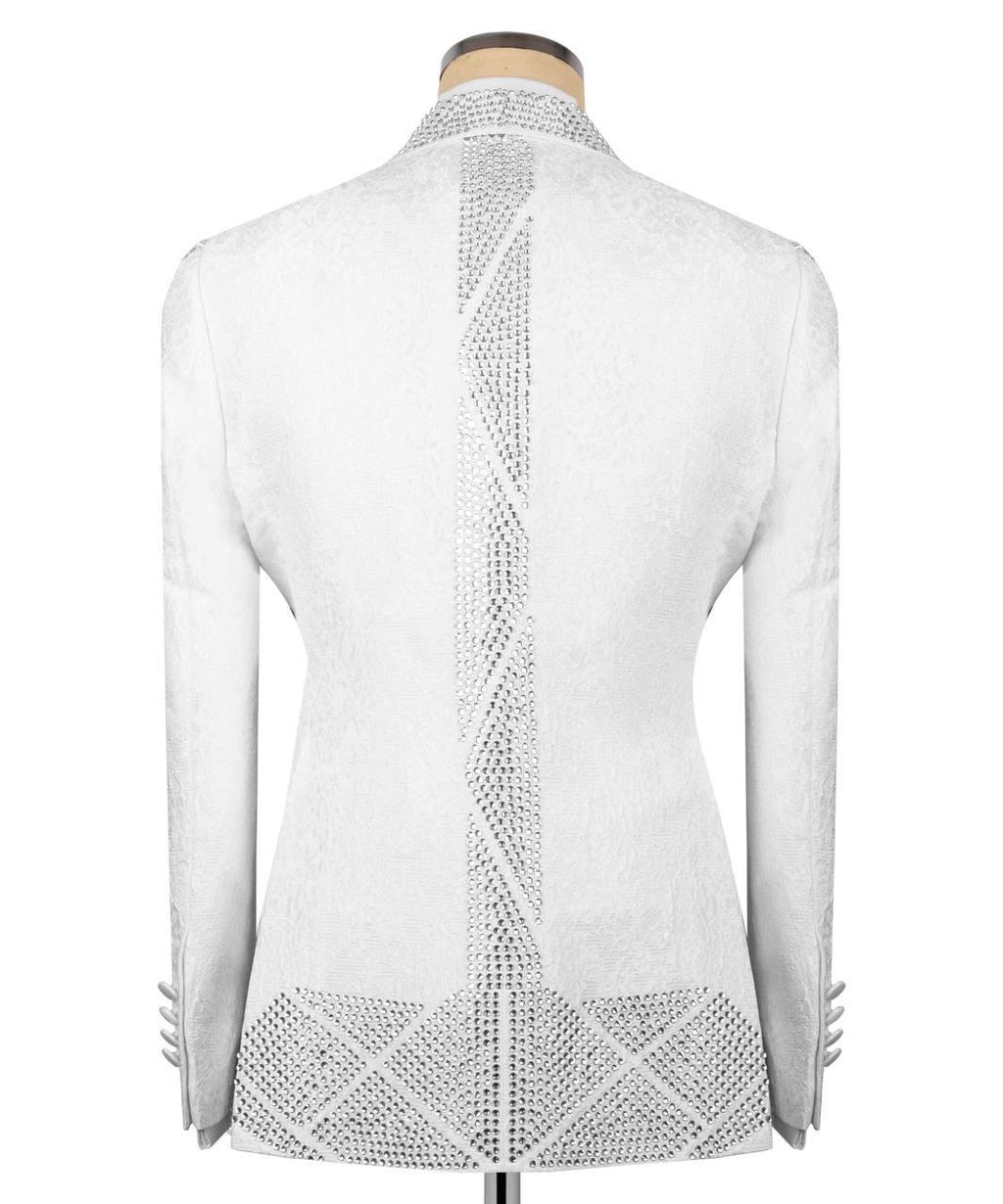 White textured blazer shown from the back on a mannequin, featuring a vertical channel of rhinestones down the center back and a matching horizontal band at the hem.