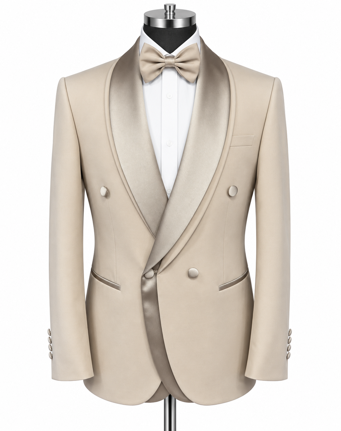 A beige double-breasted tuxedo jacket with satin peak lapels, displayed on a mannequin torso with a white dress shirt, beige bow tie, and matching beige buttons.