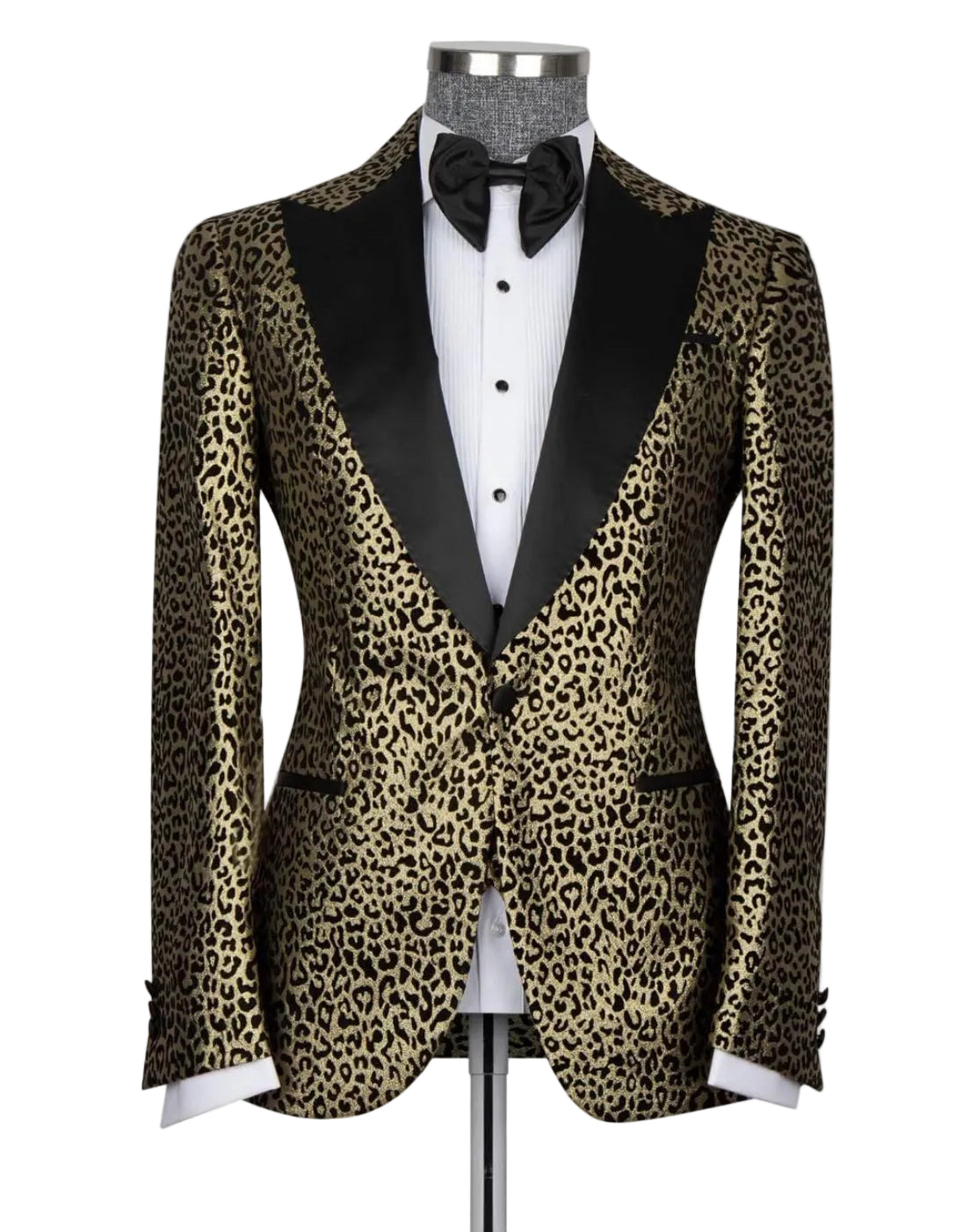 A men's tuxedo jacket with a gold and black leopard print pattern and black satin lapels, displayed on a mannequin with a white tuxedo shirt and black bow tie against a light gray background.