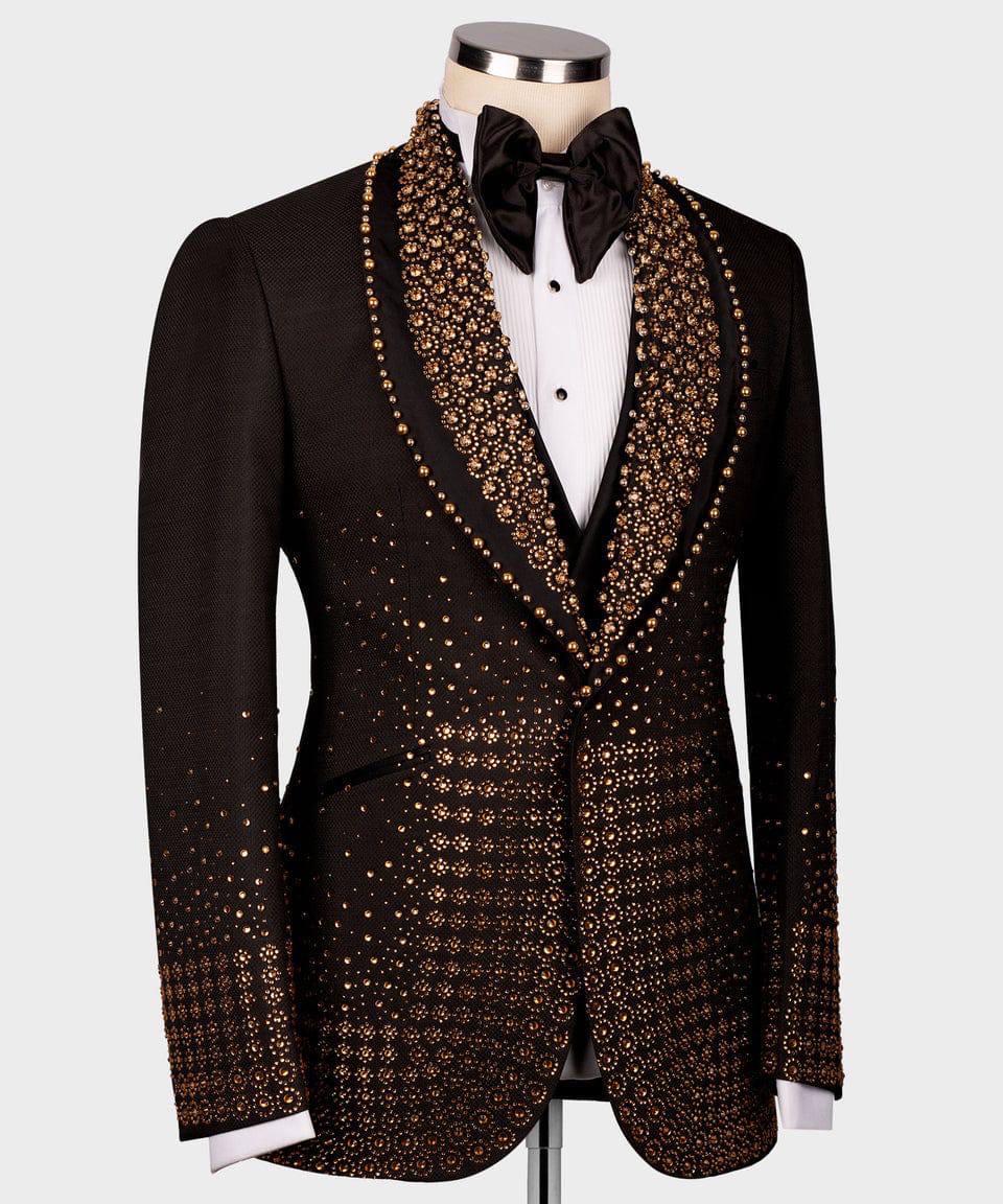 Black tuxedo with gold embellishments on a mannequin against a white background