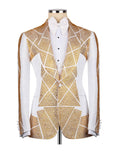 A white tuxedo jacket embellished with gold rhinestone geometric patterns, styled with a white pleated shirt and a white bow tie on a mannequin torso.