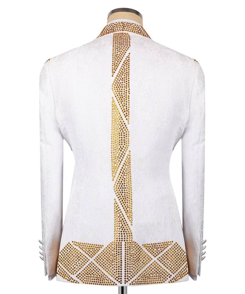 White long-sleeve blazer shown from the back on a mannequin, featuring a vertical and horizontal geometric pattern of gold rhinestones.