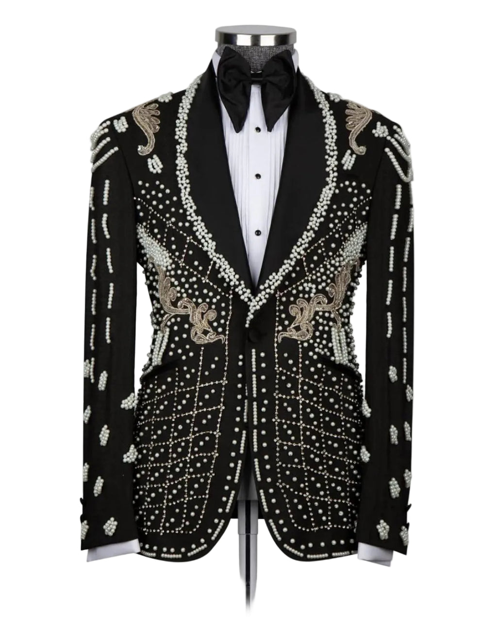 A black tuxedo jacket with ornate silver and gold beadwork and embroidery, styled on a mannequin with a white tuxedo shirt and black bow tie against a light gray background.